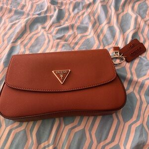 GUESS Tan Clutch with Gold Accents
